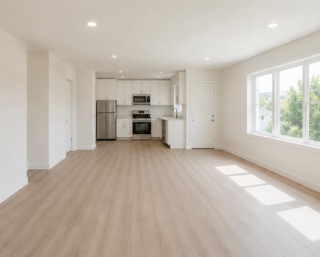 Finished apartment unit with new flooring and kitchen